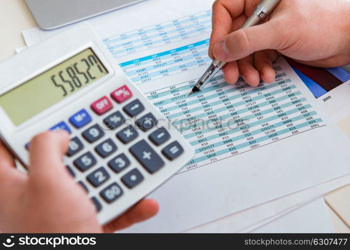 Finance analyst looking and financial reports. The finance analyst looking and financial reports