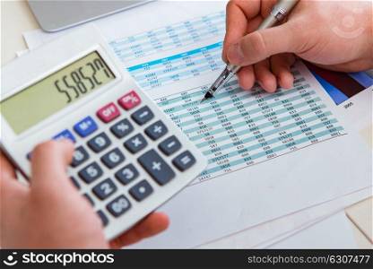 Finance analyst looking and financial reports. The finance analyst looking and financial reports