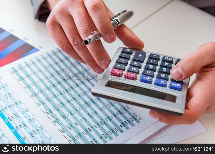 Finance analyst looking and financial reports. The finance analyst looking and financial reports