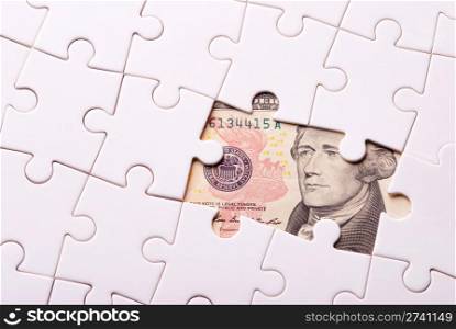 Finance concept. Find out wealth from the puzzle game.