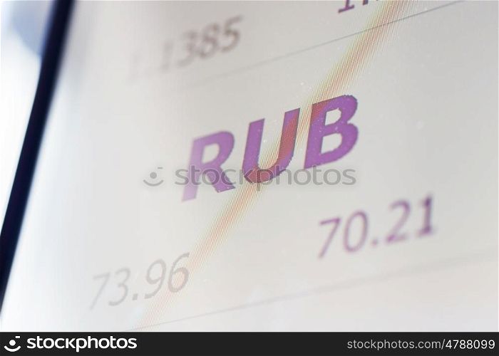 finance, currency and money concept - digital display with ruble exchange rate on screen