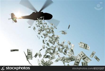 finance, economy and monetary policy concept - helicopter dropping money in sky. helicopter dropping money in sky. helicopter dropping money in sky