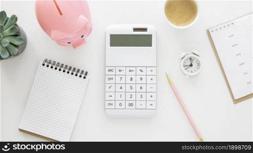 finance elements arrangement with empty notepad calculator. Resolution and high quality beautiful photo. finance elements arrangement with empty notepad calculator. High quality beautiful photo concept