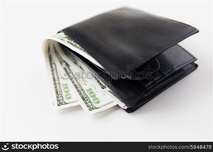 finance, investment, saving and cash concept - close up of dollar money in wallet