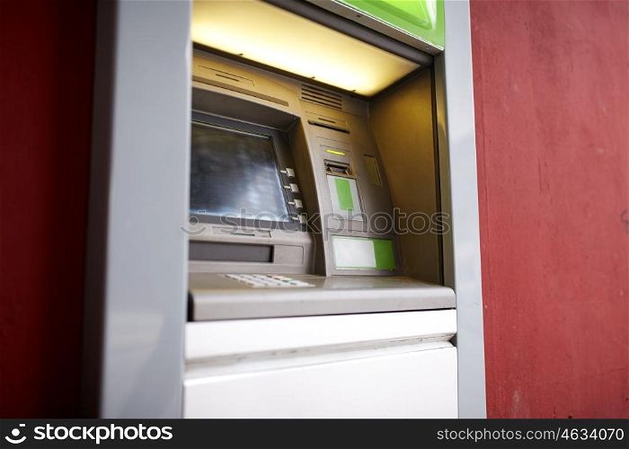 finance, money and technology concept - atm bank cash machine