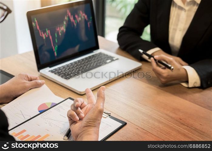 Finance trade manager showing reports screen analysis finance currency data on stock trade graph on business currency market.