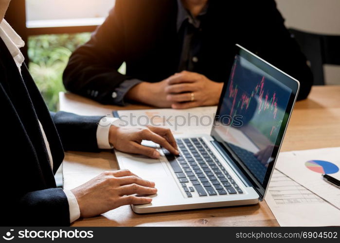 Finance trade manager showing reports screen analysis finance currency data on stock trade graph on business currency market.