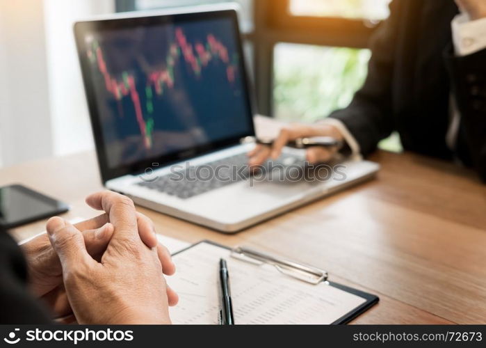 Finance trade manager showing reports screen analysis finance currency data on stock trade graph on business currency market.