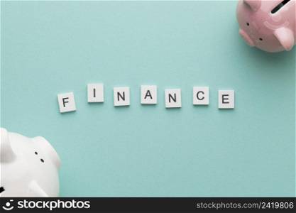 finance word with piggy banks