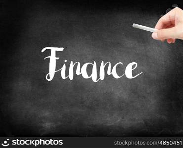 Finance written on a blackboard