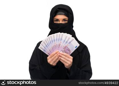 finances and people concept - muslim woman in hijab with money over white background. muslim woman in hijab with money over white