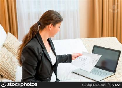 financial analyst studying graphic condition of the organization in the journey