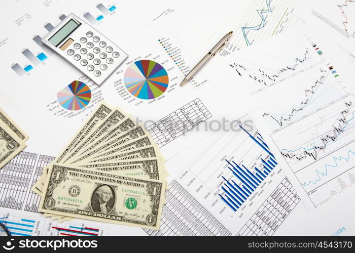 financial charts and graphs on the table