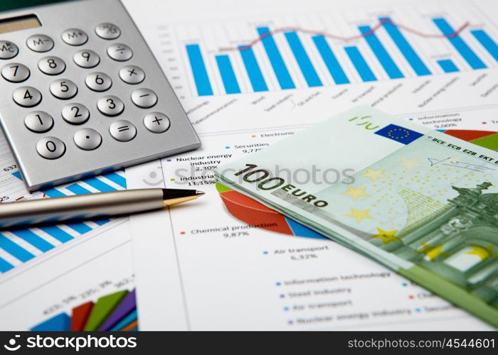 financial charts and graphs on the table