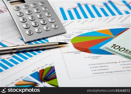 financial charts and graphs on the table