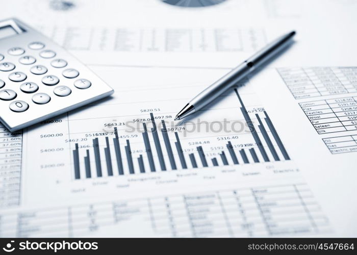 financial charts and graphs on the table