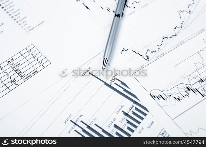 financial charts and graphs on the table