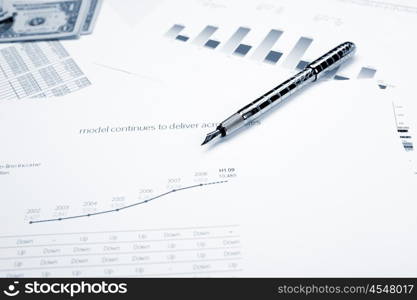 financial charts and graphs on the table