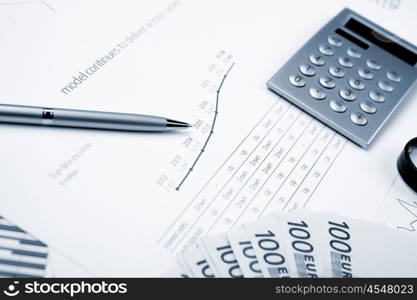 financial charts and graphs on the table