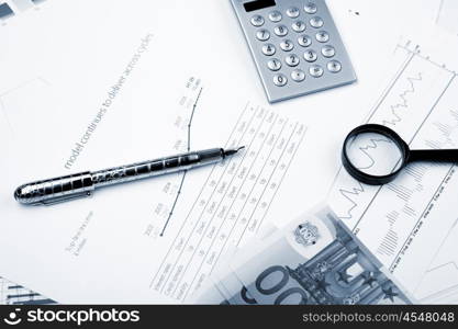 financial charts and graphs on the table