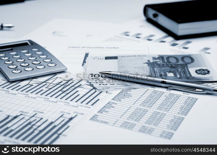 financial charts and graphs on the table