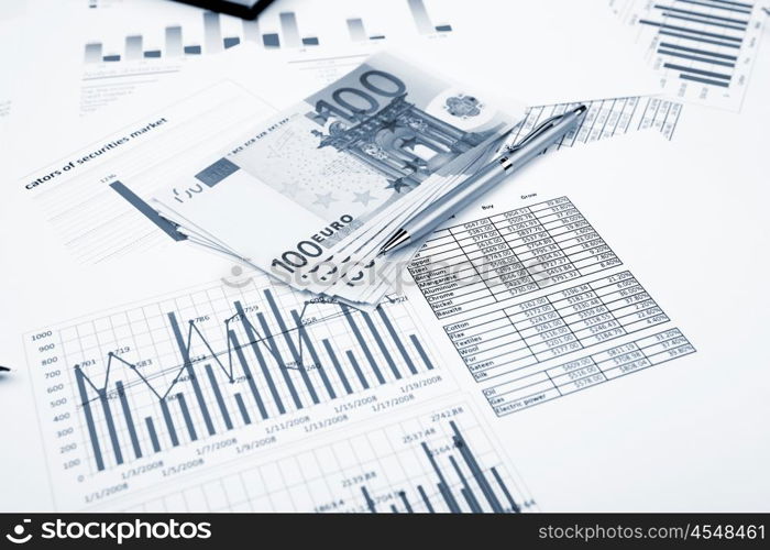 financial charts and graphs on the table