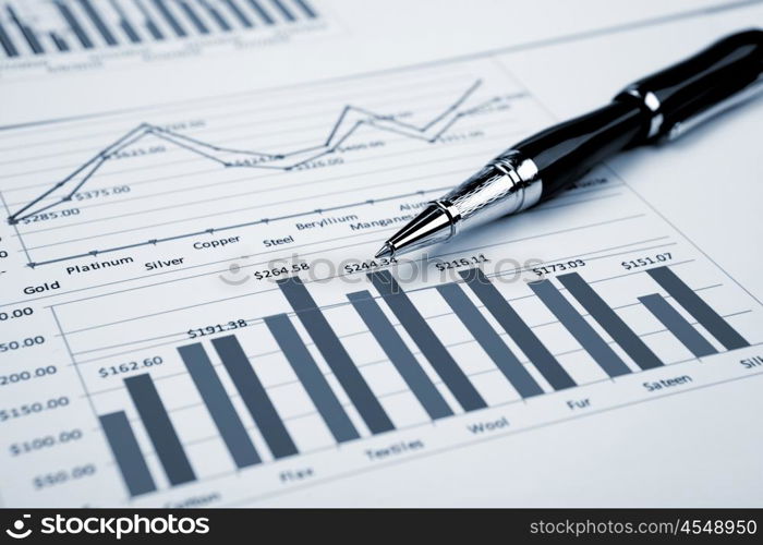 financial charts and graphs on the table