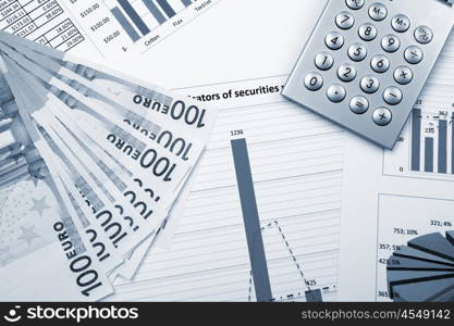 financial charts and graphs on the table