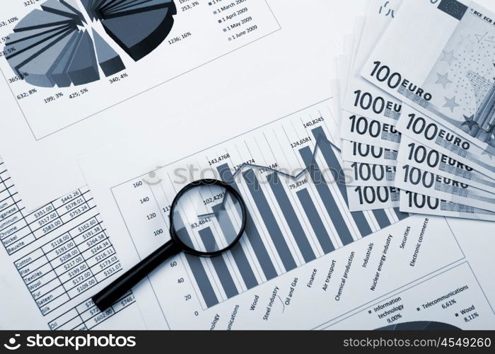 financial charts and graphs on the table