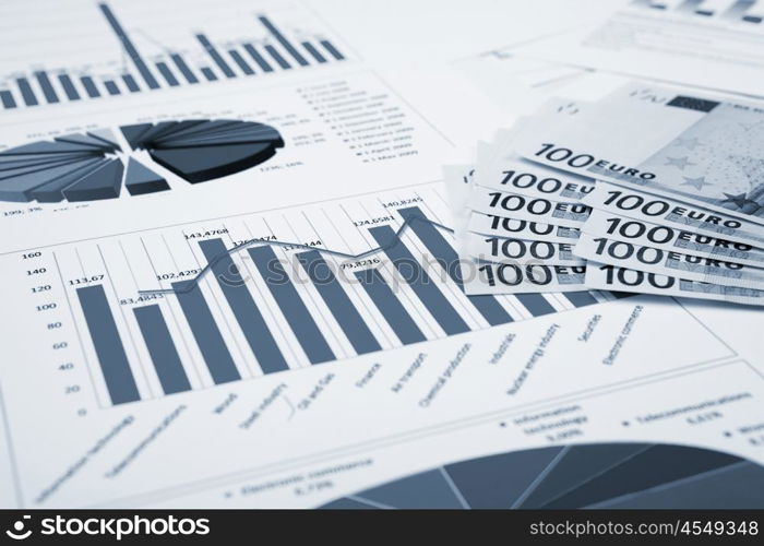 financial charts and graphs on the table