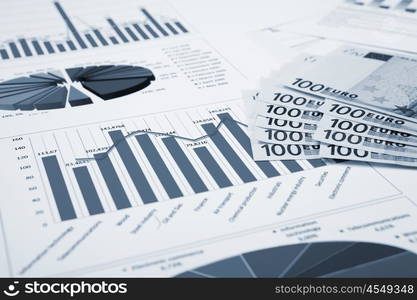 financial charts and graphs on the table