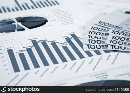 financial charts and graphs on the table