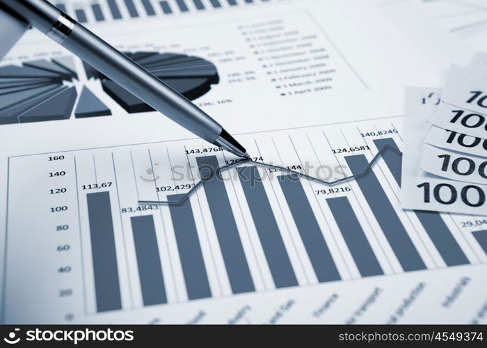 financial charts and graphs on the table