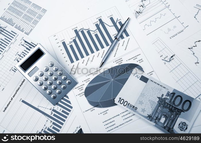 financial charts and graphs on the table