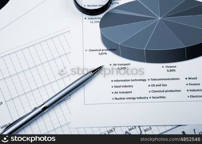 financial charts and graphs on the table