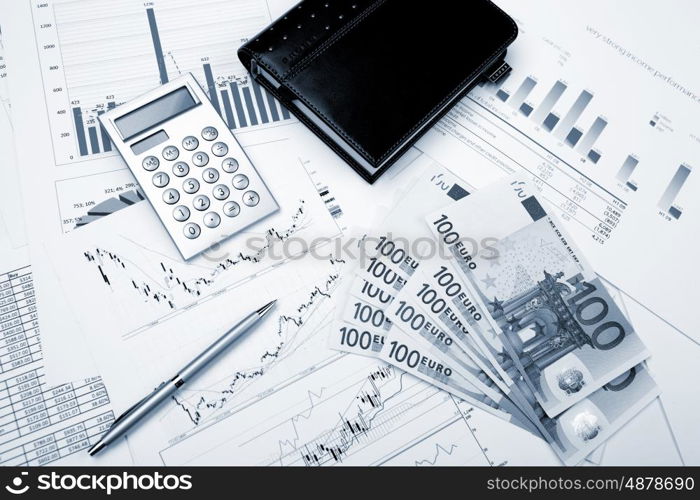 financial charts and graphs on the table