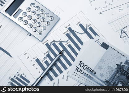 financial charts and graphs on the table