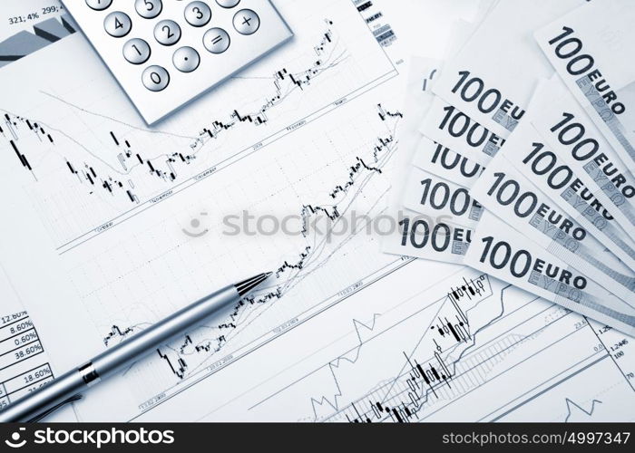 financial charts and graphs on the table