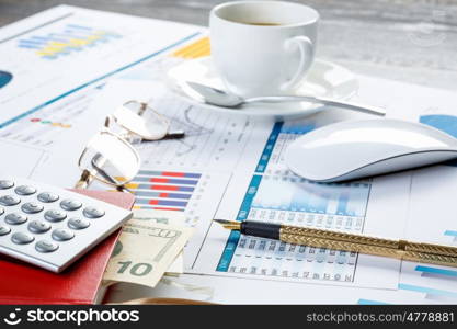 Financial charts and graphs on the table. financial charts and graphs and a pen on the office table