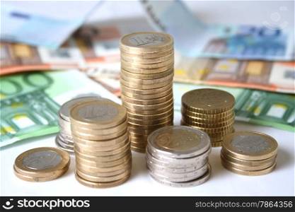 Financial concept. Euro coins and banknotes.
