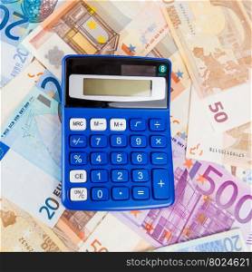 Financial concept. Euro money. Euro notes with calculator