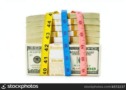 Financial concept - measuring money isolated on white