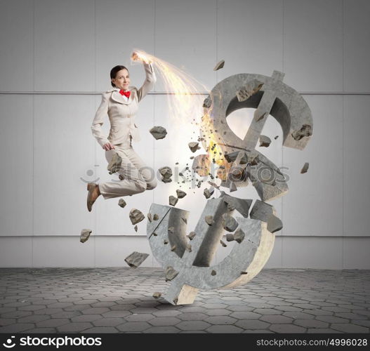 Financial crisis concept. Emotional businesswoman breaking with hand stone dollar symbol