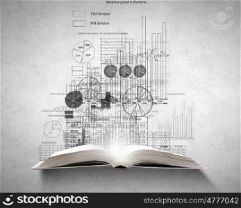 Financial education concept. Old opened book with infograph sketches over concrete background
