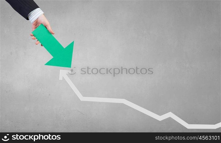 Financial growth and increase. Hand holding arrow representing business growth concept