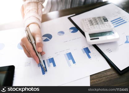 Financial inspector making report calculating or checking balance. Business Audit concept.
