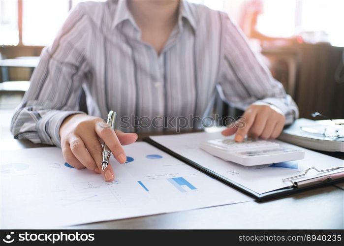 Financial inspector making report, calculating or checking balance. Business Audit concept.