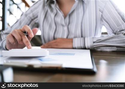 Financial inspector making report calculating or checking balance. Business Audit concept.