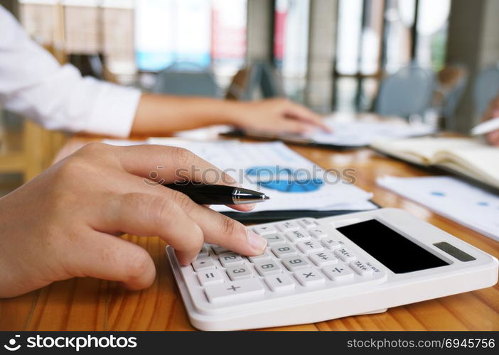 Financial inspector making report, calculating or checking balance. Business Audit concept.