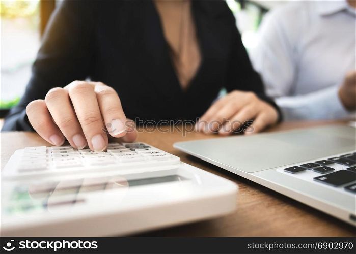 financial inspector with accountant working with digital documents valuation data